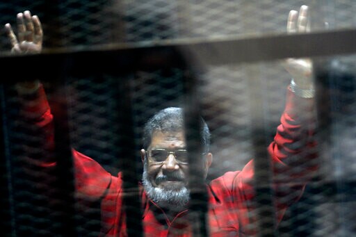 The Latest: Lawyer Describes Morsi's Collapse During Trial