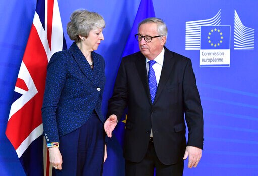 The Latest: May, Juncker to Meet again on Brexit Wednesday