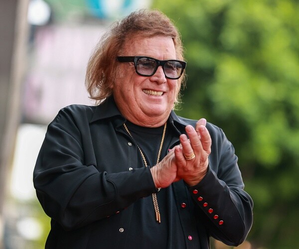 don mclean smiles and claps 