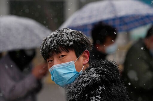 China's Shenzhen to Reopen, Still Trying to Contain Virus