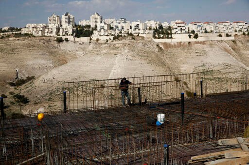 The Latest: Israel Delays Vote on Settlement Annexation