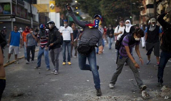 Venezuelans Clash as Jailed Opposition Leader Sits