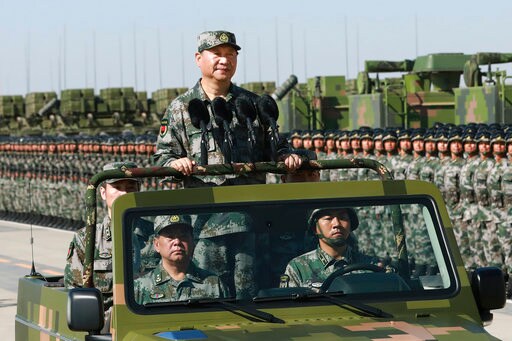 Chinese President Oversees Military Parade in Show of Might