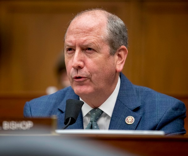 rep. dan bishop speaks from a desk