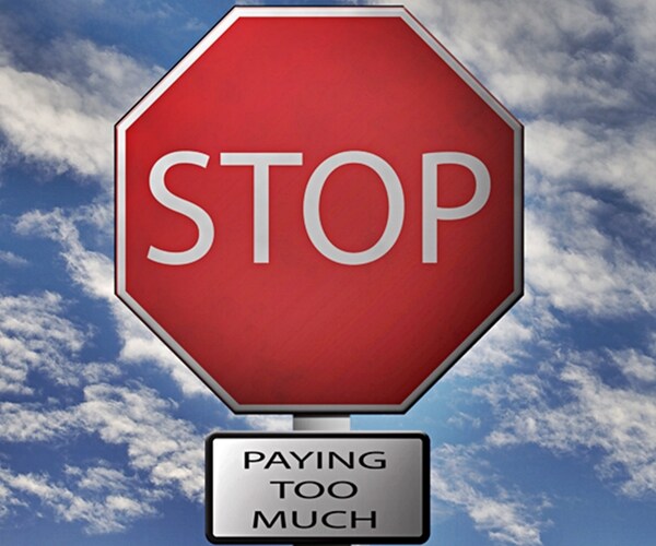 constructed stop sign image displaying stop paying too much message 

