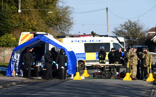 The Latest: Merkel Urges Russian Transparency in Ex-spy Case