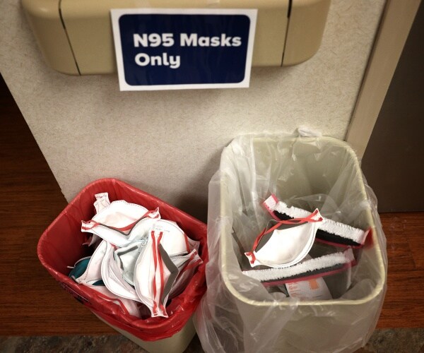 N95 masks in trash