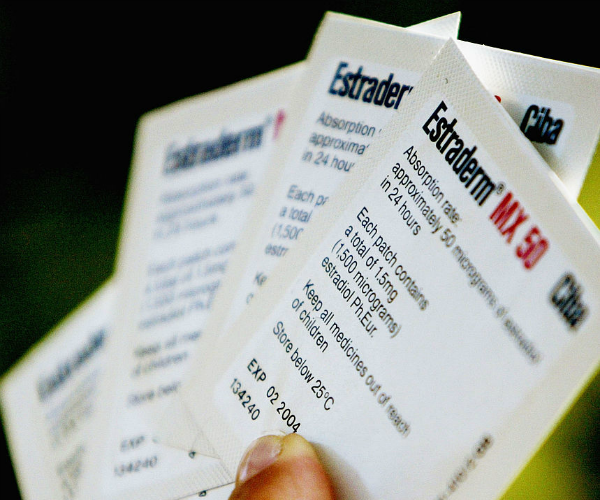 A woman with her hormone replacement patches