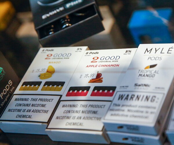 pods for flavored e-cigarettes are piled up in a new jersey store