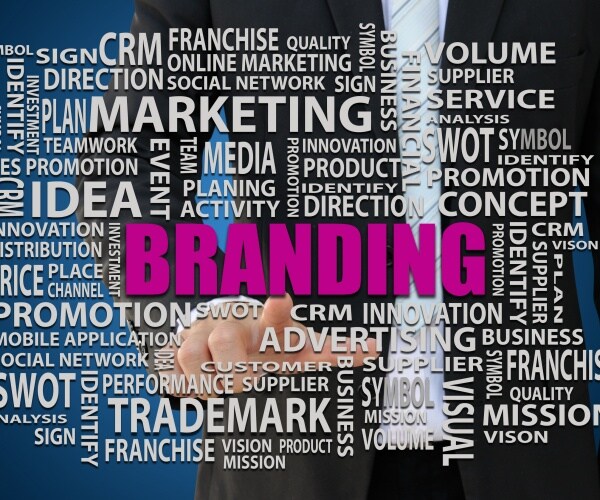 businessman pointing branding word of marketing concept