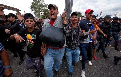 The Latest: Trump Threatens Honduran Aid Cut over Caravan