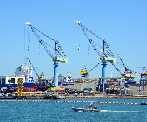 Biden Signs Ocean Shipping Bill in Bid to Reduce Export Backlogs