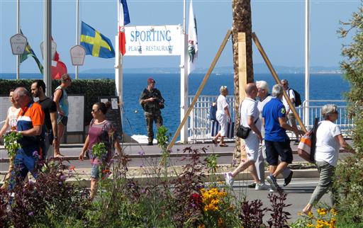 The Latest: France Holds Moment of Silence for Nice Victims