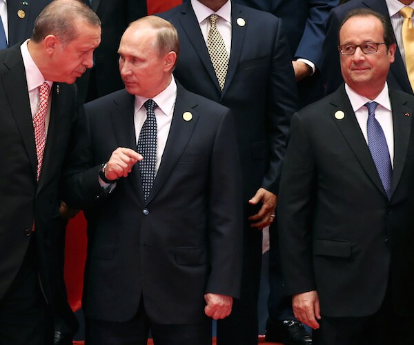 Vladimir Putin's France Trip Off After 'War Crimes' Riff