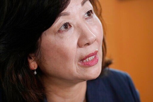 The AP Interview: Japan Minister Says Women 'underestimated'