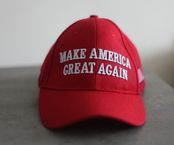 red maga hat with white lettering