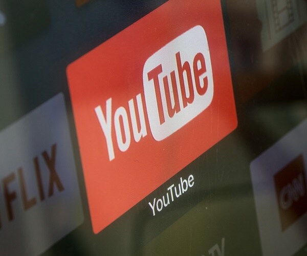 a youtube logo is on a moniter