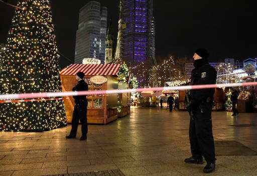 The Latest: Berlin Arrest Driver of Truck That Rammed Market
