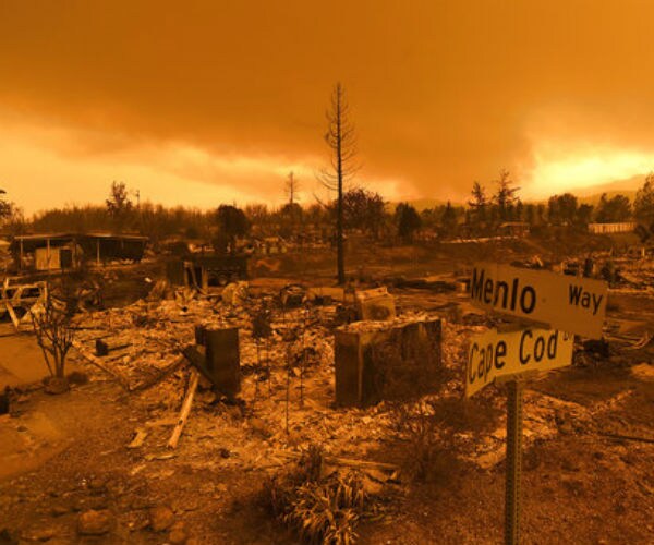 Wildfire Destroys 500 Structures, Nearly Levels Community