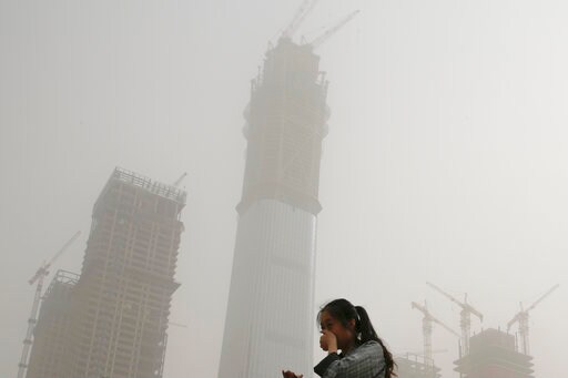 Sandstorm Blankets Huge Area of China in Dusty Pollution
