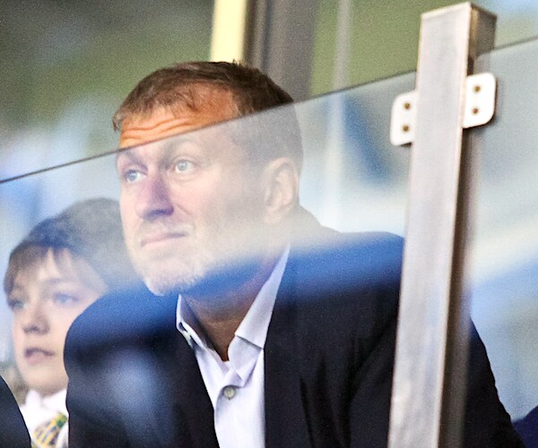 Billionaire Roman Abramovich takes in a Chelsea Football Club game.