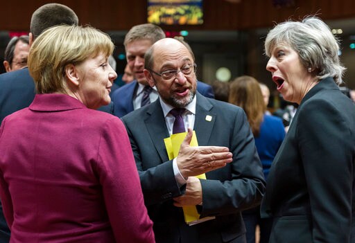 The Latest: UK Shifts Brexit Team; Opposition Sees "chaos"