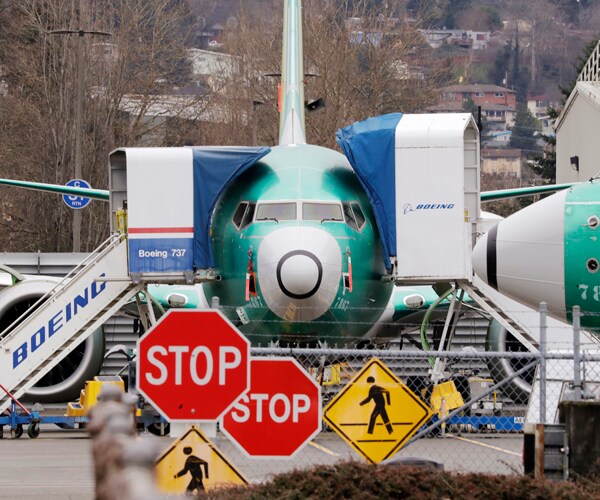 boeing 737 max jets sit at an airport in renton, washington