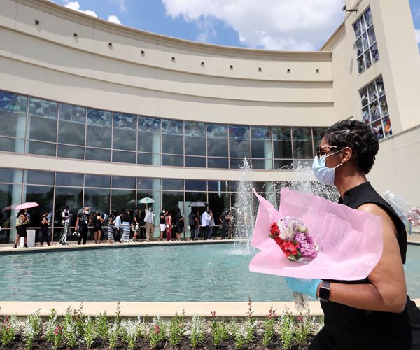 Hundreds Line Up for George Floyd's Memorial in Houston