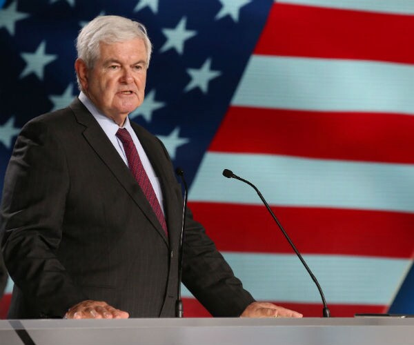 Newt Gingrich is shown with the American flag displayed in the background.