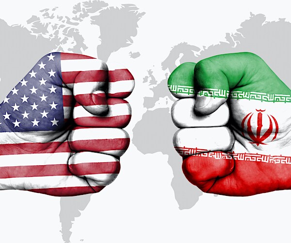 a fist painted like the american flag collides with a fist painted like the iran flag