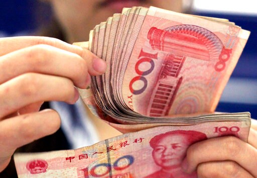 China's Yuan Sinks Further after US Currency Report