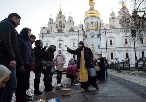 Orthodox Christians Observe Easter with Candles, Prayers