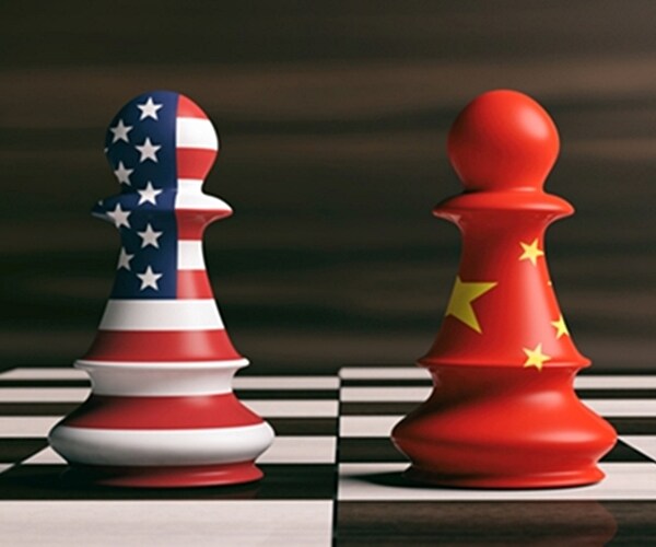 usa and china cooperation concept. us america and china flags on chess pawns soldiers on a chessboard.

