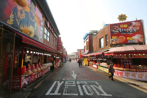 Stress, Rumors, Even Violence: Virus Fear Goes Viral