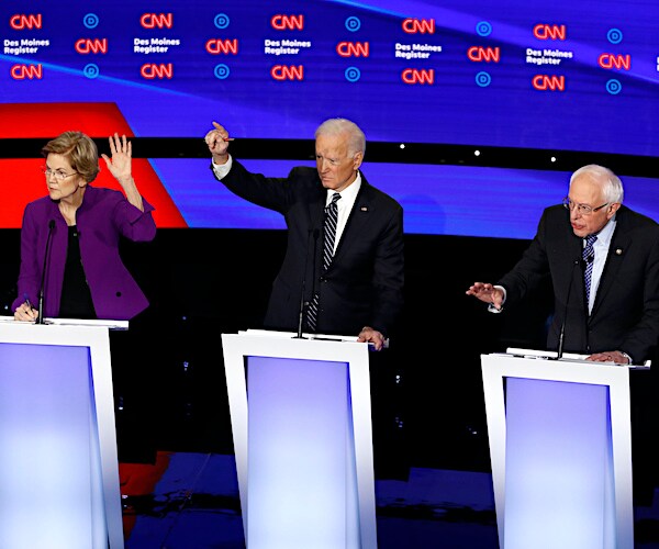 elizabeth warren, joe biden and bernie sanders on the debate stage