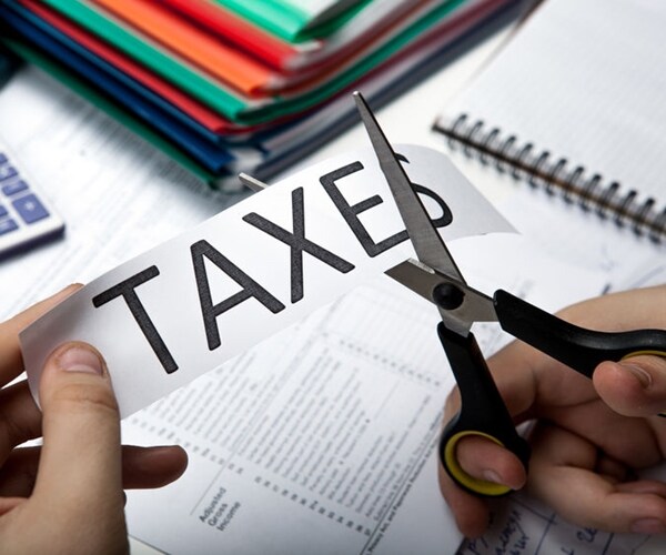 GOP Tax Plan Trims Top Rate for Wealthy, Cuts Corporate Rate