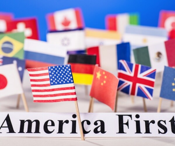 america first banner and us flag