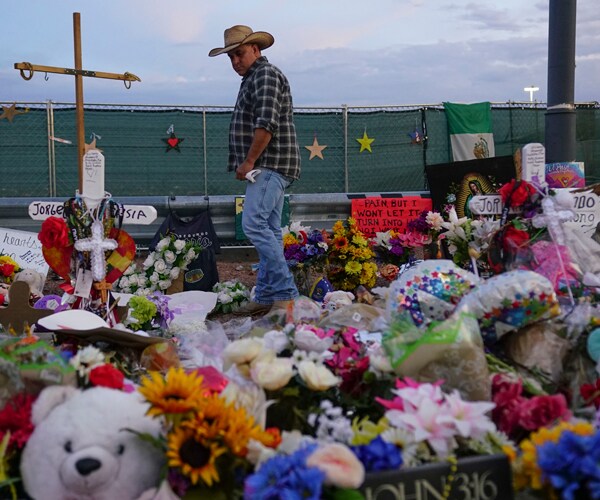 A makeshift memorial near the scene of a mass shooting in El Paso, Texas