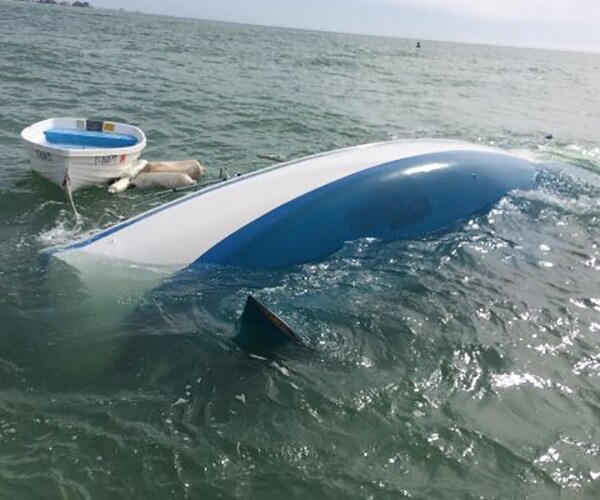 After Selling Everything to Buy It, Couple's Dream Boat Sinks