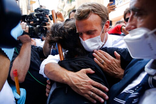 In Devastated Beirut, French Leader Offers Comfort and a Hug