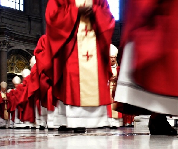cardinals line up for mass at the vatican