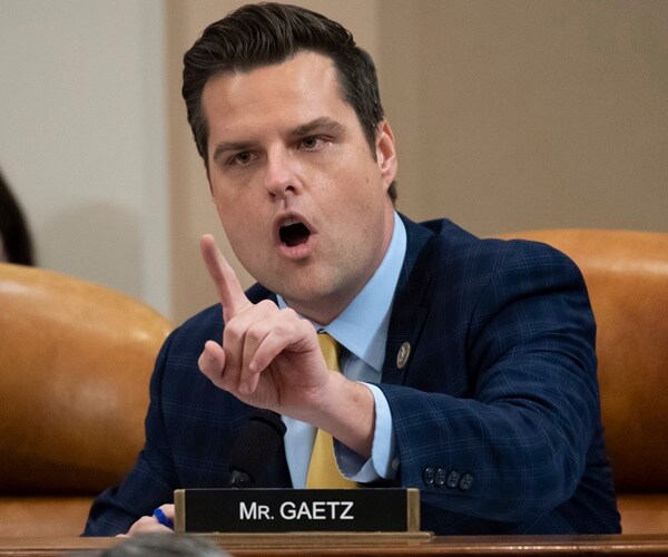 matt gaetz questions someone while pointing