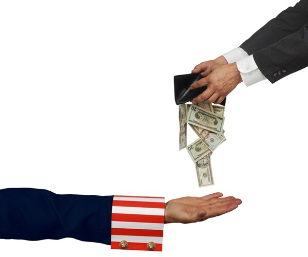 Why American Workers Pay Twice as Much in Taxes as Wealthy Investors