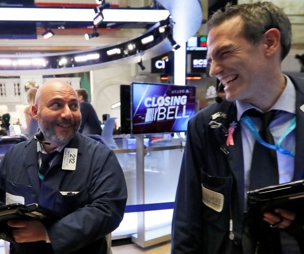 Wall St Jumps as Jobs Report Eases Rate Worries