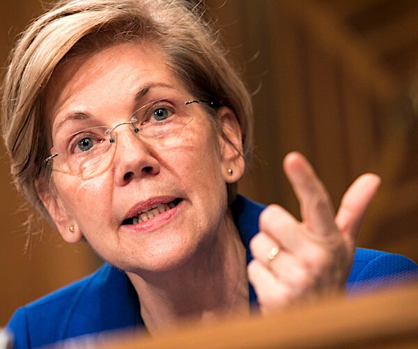 elizabeth warren points and speaks during a senate hearing