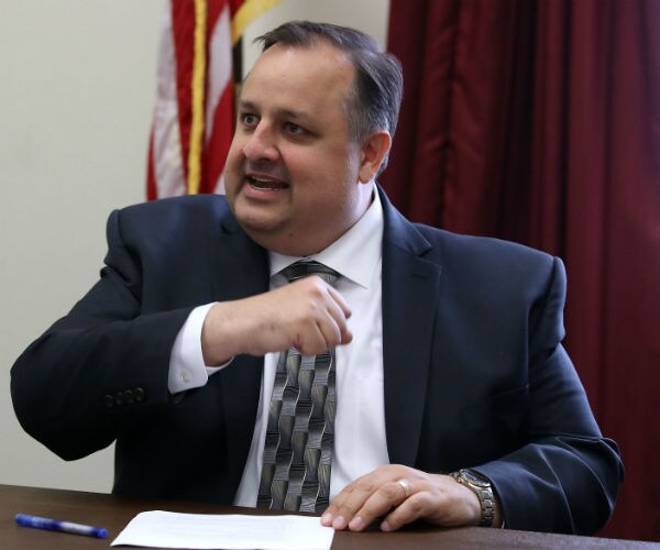Walter Shaub, ex-director of the Office of Government Ethics, makes a point as he gestures with a clinched right fist