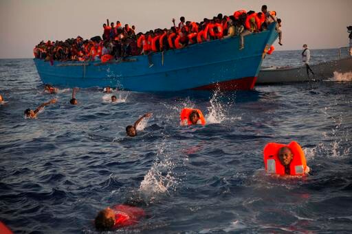 The Latest: Germany to Deport 50 Afghan Asylum-seekers