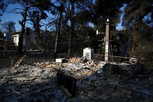 Forensics Experts Work on Identifying the Dead in Greek Fire
