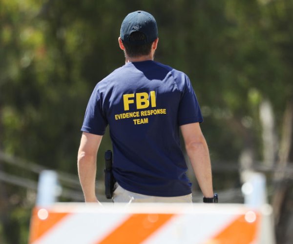 an fbi agent works the scene of a mass shooting in gilroy california in 2019