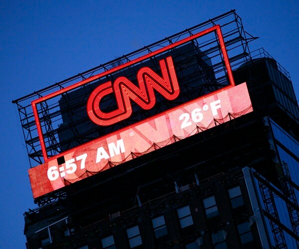 cnn sign at the top of a building